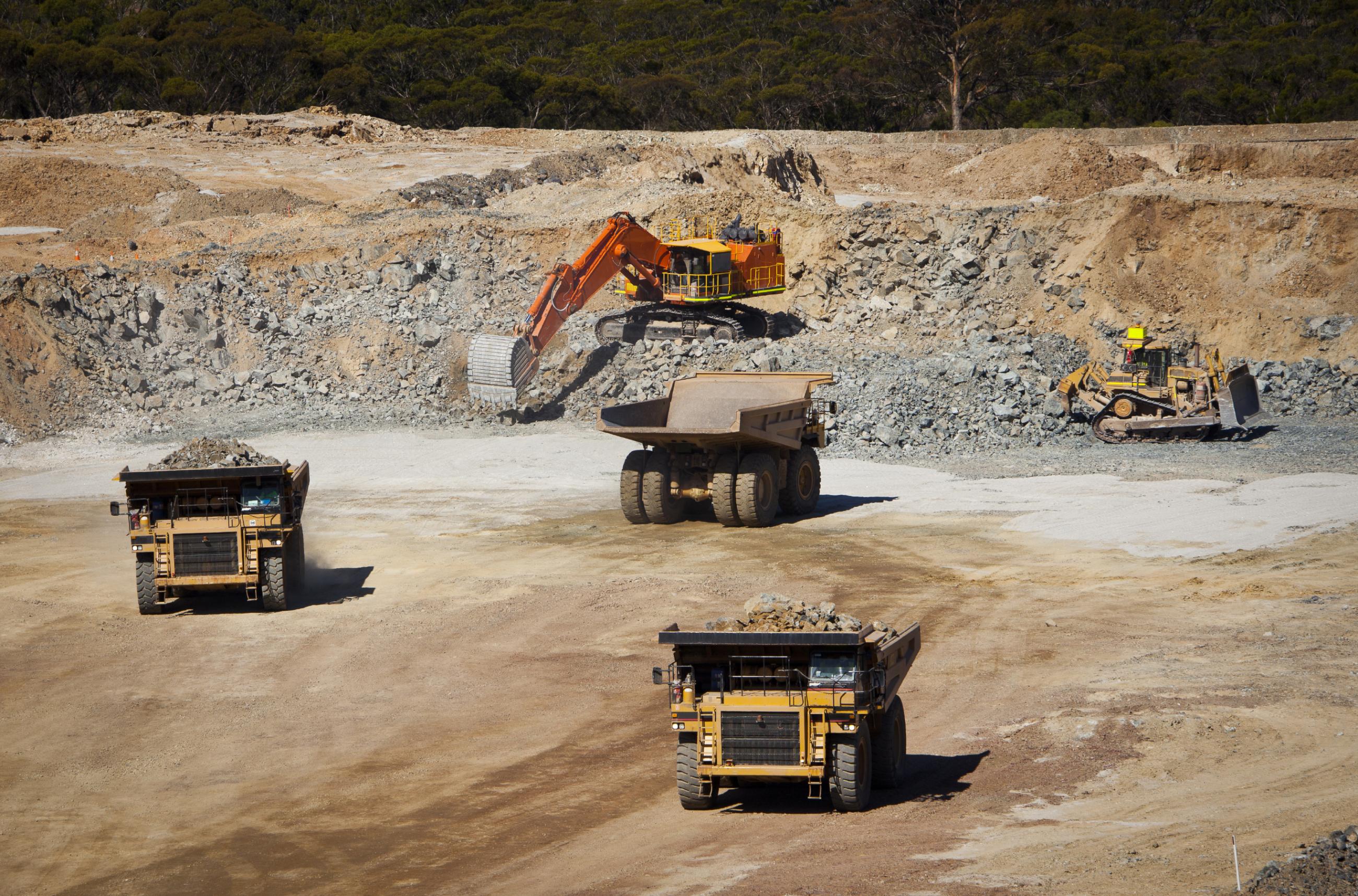 Construction vehicles in a mining site