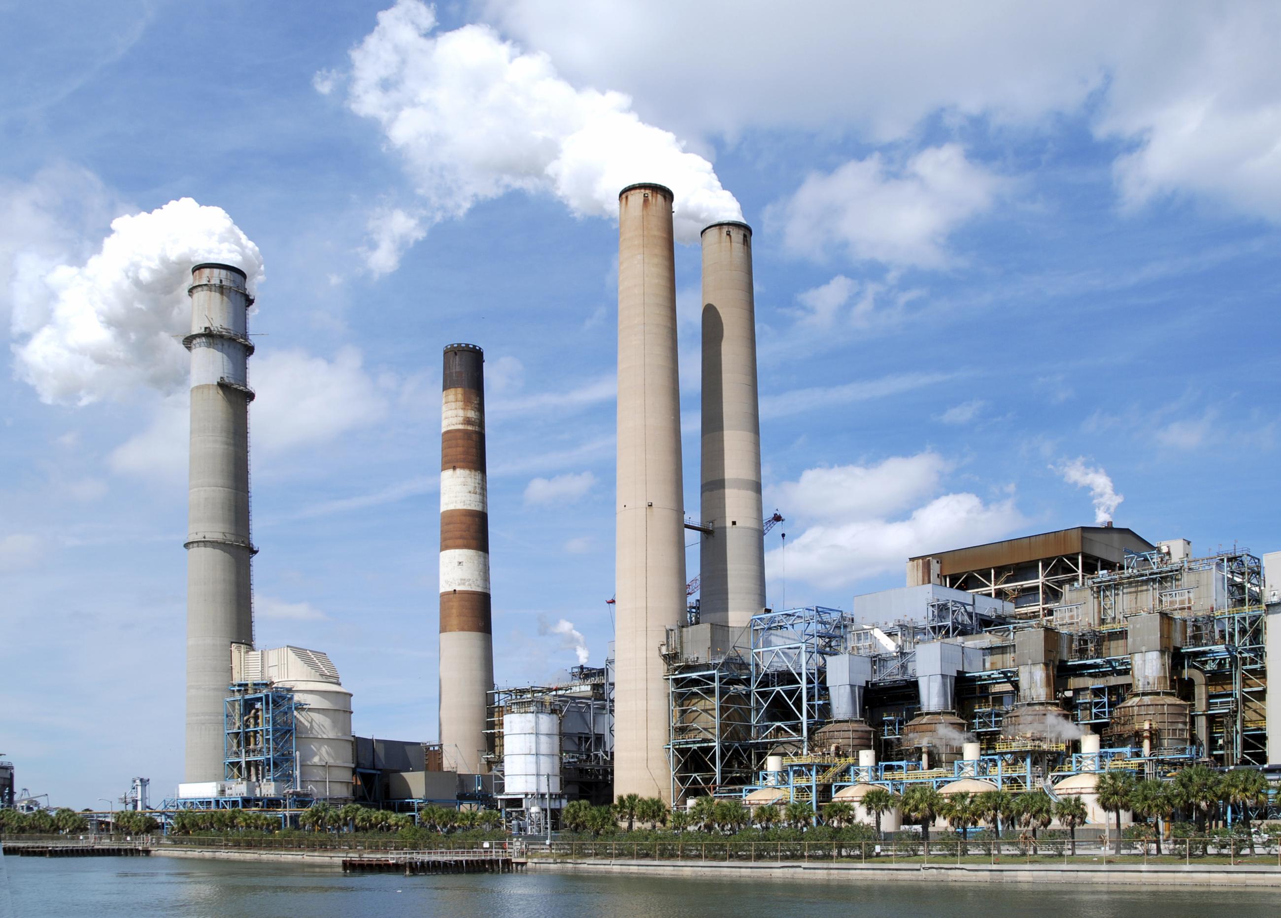 Power generation station with 4 visible smoke stacks 